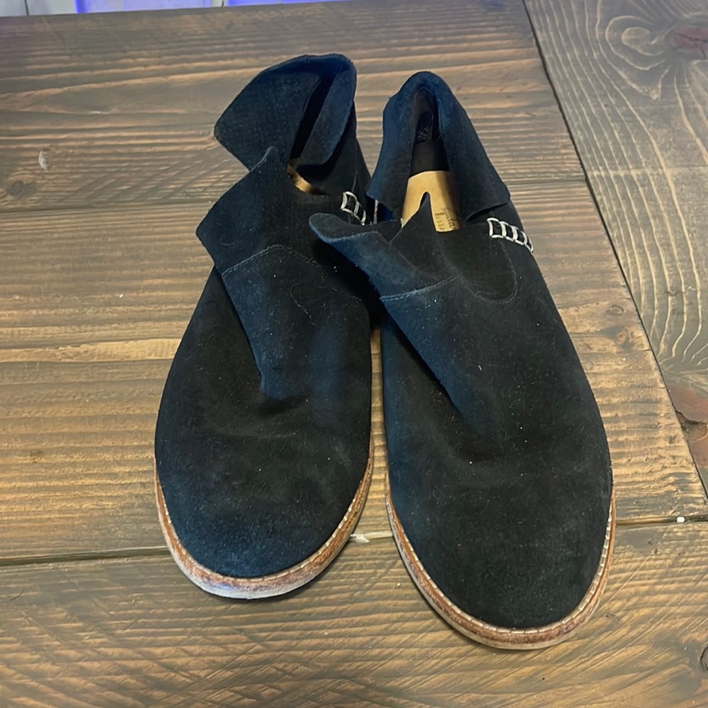 Black suede Clark’s